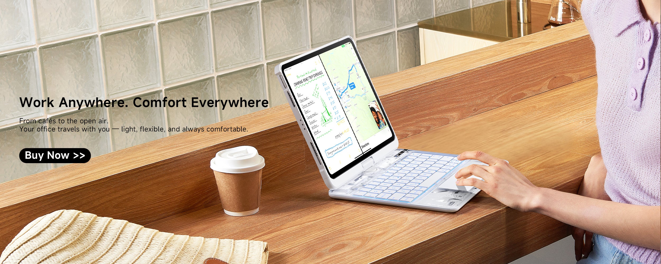 Work Anywhere, Comfort Everywhere – A person using a transparent iPad keyboard case in a cafe, showing the flexible and portable nature of the setup, designed for both work and relaxation.
